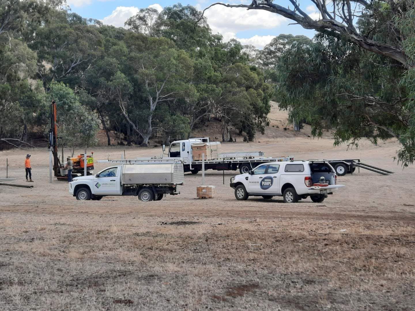The Birdwood Pumps team and vehicles on a job site